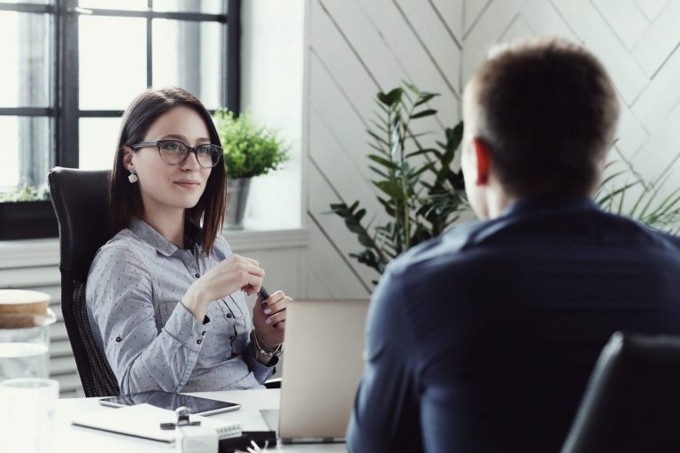 Picture of hiring manager illustrates blog: 5 Ideas to Get Unrehearsed Answers in Job Interviews