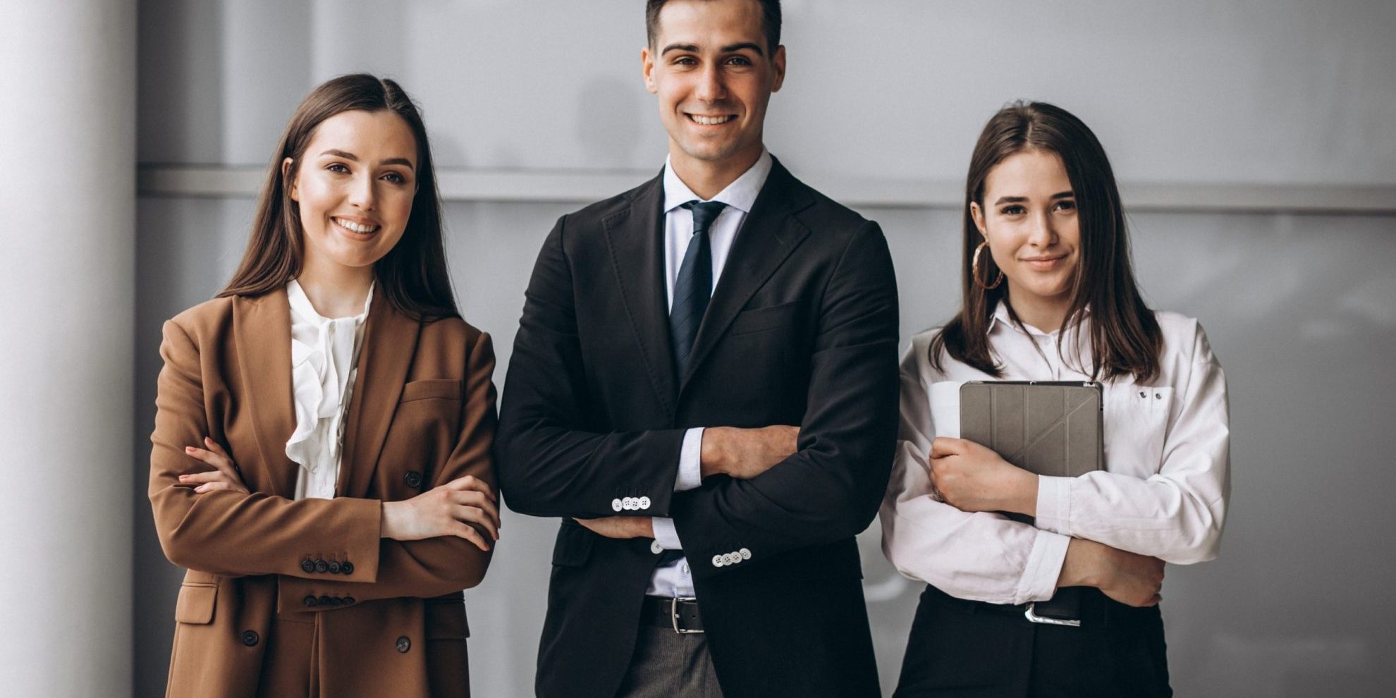 Photo of confident employees illustrates blog "Tips to Win the War for Talent "