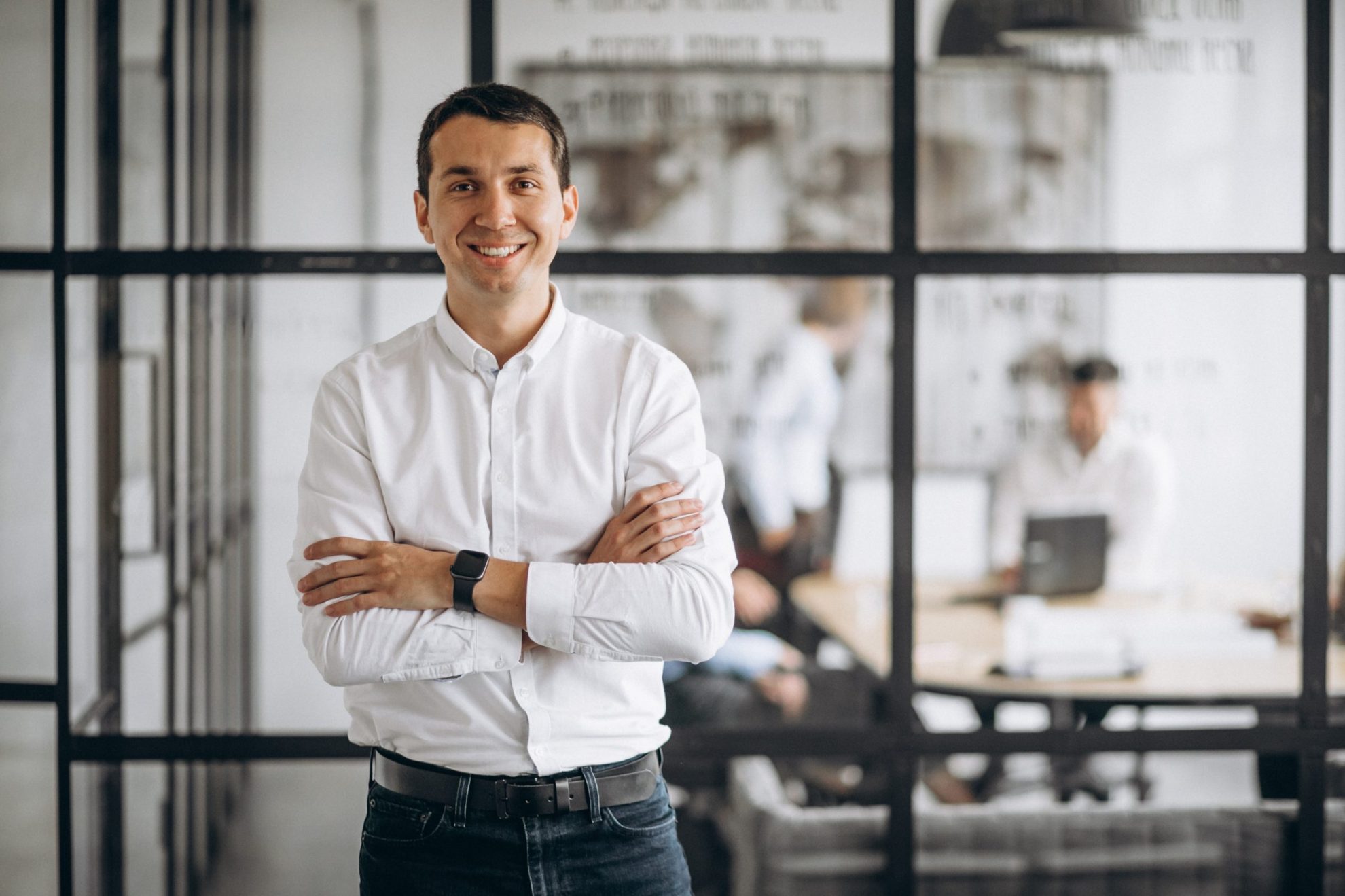 Photo of confident business owner illustrates blog: "How to Stand Out as an Employer"