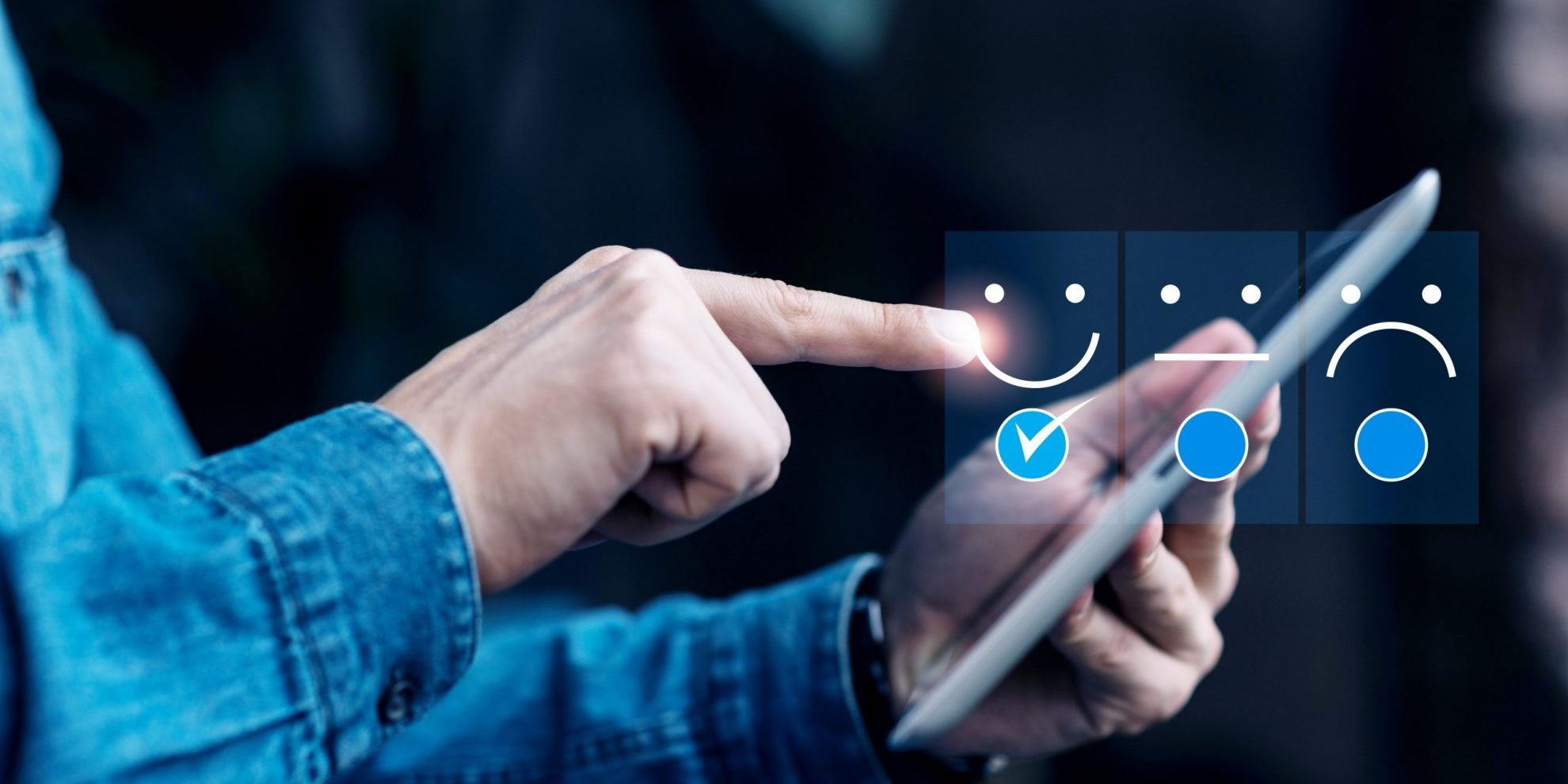 BrandReputation Closeup of man holding tablet with overlay of smiley face, neutral face, and sad face illustrates blog "What Is Brand Reputation and Why It Matters"