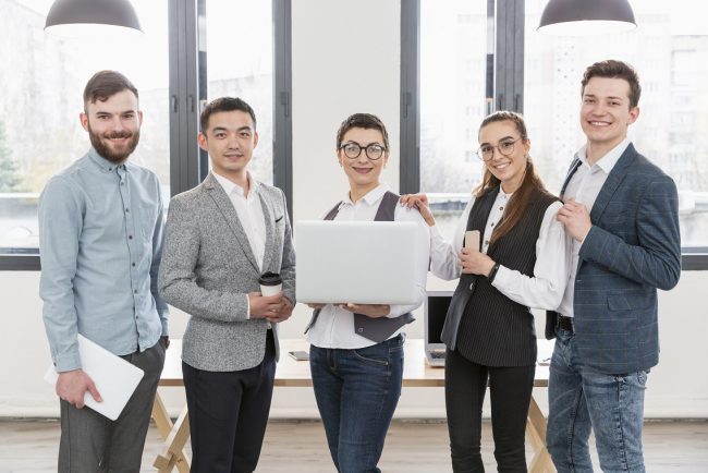 team-office-freepik Team in office illustrates blog "Best Practices for Implementing Background Checks in Your Small Business"