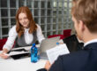 HR professional conducting temporary employee background check during seasonal hiring