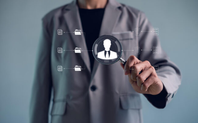 online-documentation-database-process-automation-efficiently-manage-filescorporate-business-technologydocument-management-system HR professional explaining transparent background screening to job candidate