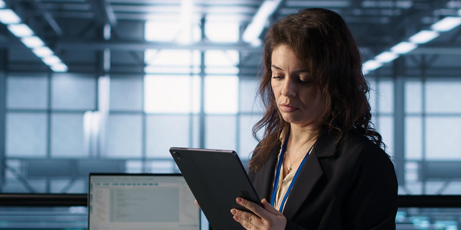 121038 HR professional reviewing I-9 and E-Verify compliance records