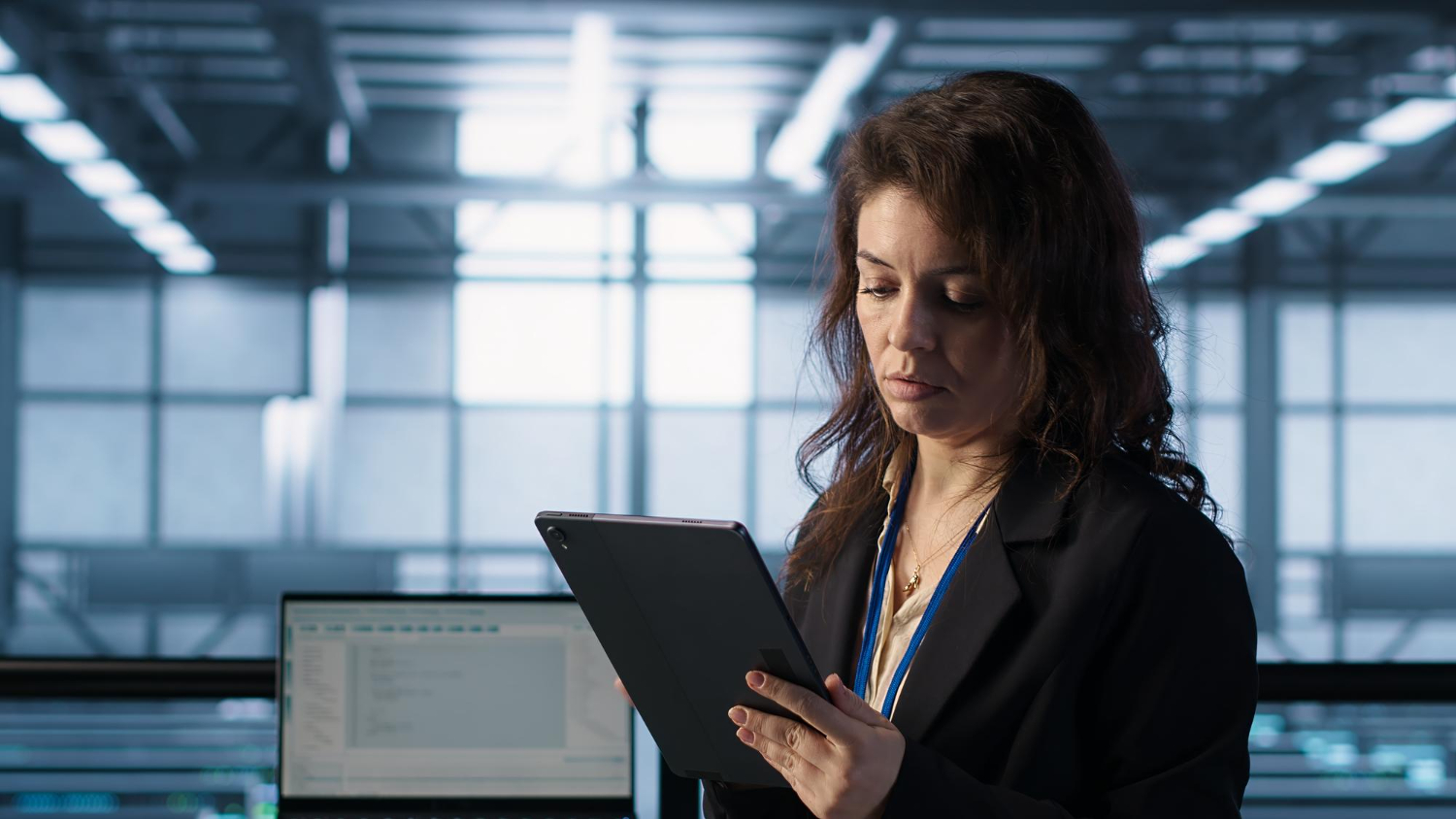HR professional reviewing I-9 and E-Verify compliance records