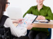 HR professional reviewing soft skills assessment and background verification results