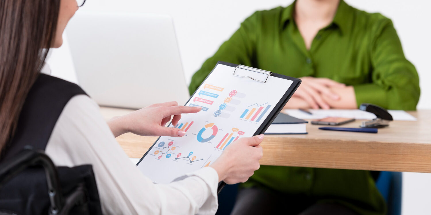 2148476472 HR professional reviewing soft skills assessment and background verification results