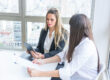 HR professional discussing employer brand background checks with job candidate