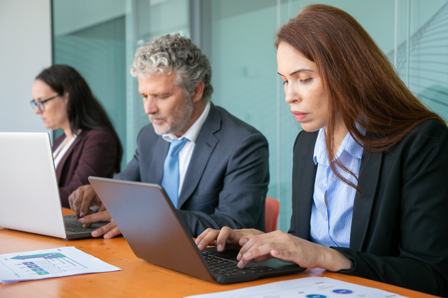 HR team managing high-volume hiring process in modern office