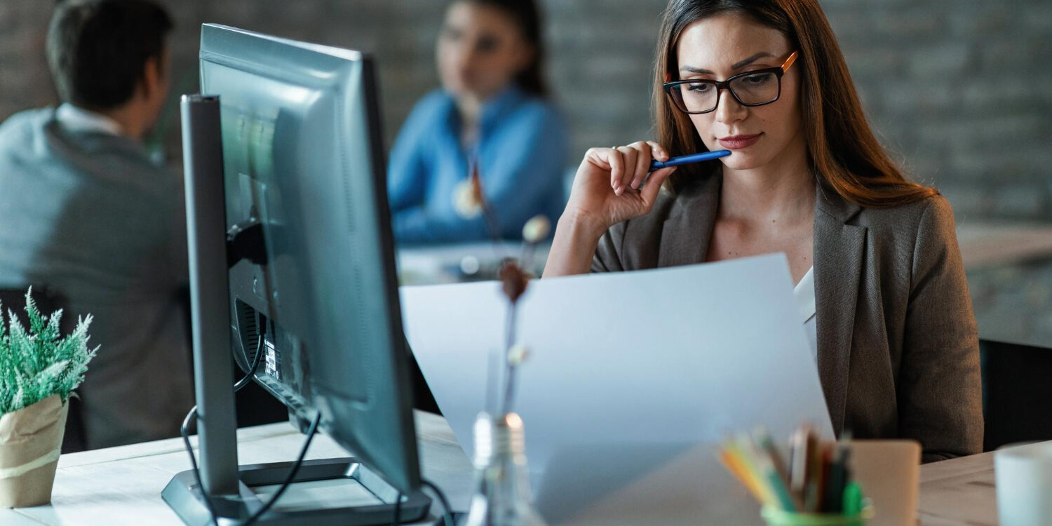 HR professional conducting customized background checks in office