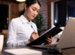 HR professional auditing a background screening policy for compliant hiring