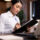 HR professional auditing a background screening policy for compliant hiring