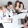 HR team preparing for a background screening audit with a compliance checklist