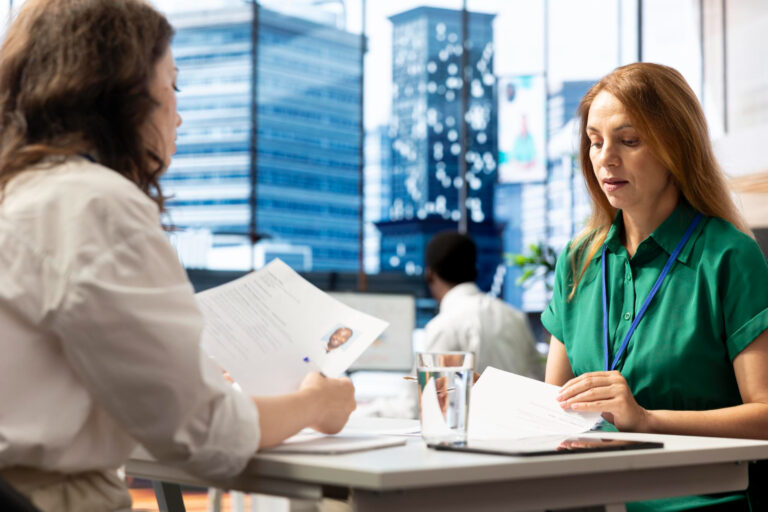 Healthcare HR professional completing healthcare background checks for a candidate