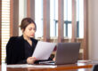 HR professional using identity verification to prevent hiring fraud