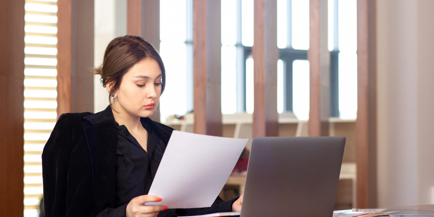 HR professional using identity verification to prevent hiring fraud
