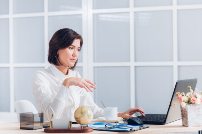 image-international-background-checks-hr HR team reviewing international background checks and candidate verification details