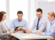 HR and compliance team performing a screening policy review