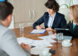 HR team conducting a screening policy review for annual hiring compliance updates